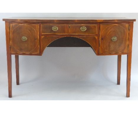 A 19th Century mahogany sideboard, with satinwood stringing, of D form with central frieze drawer over arch flanked to either