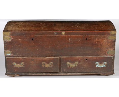 A large late 18th/19th century mahogany and brass bound marriage trunk, the domed top above two drawers and having carrying h
