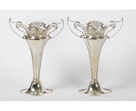 A large pair of Art Nouveau silver vases, Walker and Hall, Chester 1907, 31.3oz, 32cm high (2).  CR * Good condition.