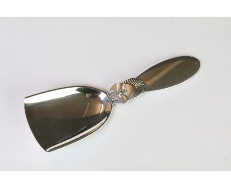 A Georg Jensen sterling silver cactus pattern caddy spoon, marked Georg Jensen, Sterling Denmark to verso, measures approx 10