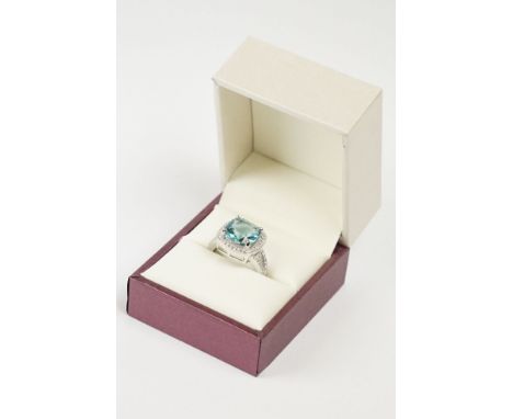 Silver CZ and Blue Topaz style Ring 
