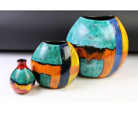 Three Poole Pottery 'Gemstones' pattern vases to include two purse vases (tallest approx 26cm), and a smaller vase of bulbous