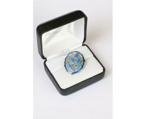 A 925 sterling silver and blue enamel pin brooch in the Art Nouveau style with bell flower decoration, marked S 925 to the ve