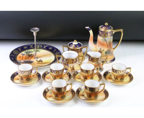 Japanese Noritake coffee set with hand painted desert scenes depicting a figure riding a camel beside palm trees, the lot com