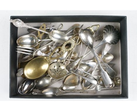 A small collection of silver and silver plated cutlery to include teaspoons, caddy spoon, sugar nips....etc.. 