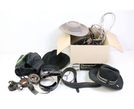 Collection of Americana cowboy hats and western belts to include a good selection of leather pistol holster belts,  leather b