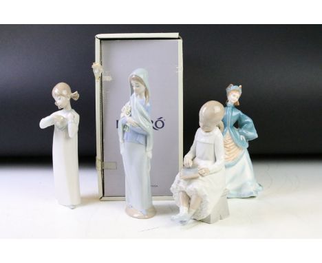 Group of Lladro figurines to include two figurines of girls, one of a lady holding lilys (boxed) and a Royal Worcester Rebecc