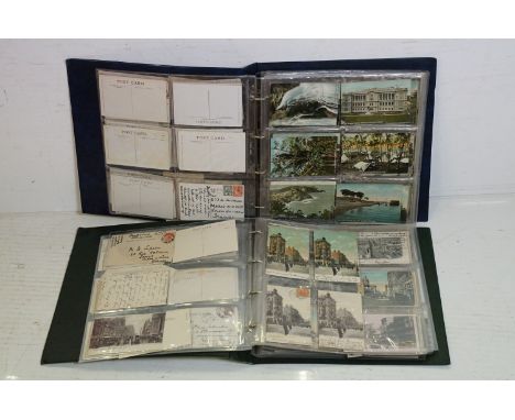 Collection of early 20th century Australian / Australian-themed postcards contained within two albums, to include an album of
