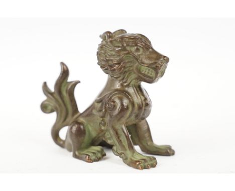 A Chinese Copper ornamental lion figural statue, stands approx 6cm in height. 