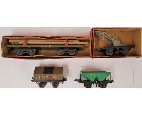 Four Hornby "0" Gauge Vehicles - No. 2 Lumber Wagon; No.1 Crane Truck; Cement Wagon; and Hopper Wagon - all boxed 