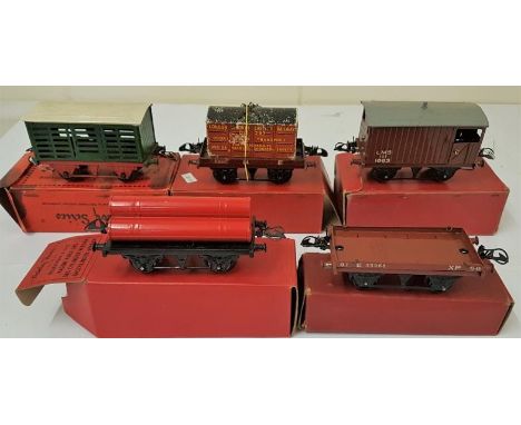 Five Hornby "0" Gauge Wagons - Flat Truck With Container; No.1 Milk Traffic Van; Goods Brake Van; Gas Cylinder Wagon; and Fla