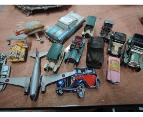 A collection of vintage toy cars and Thunderbird 5 etc