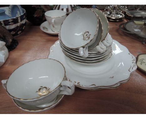 A part gilted tea service 