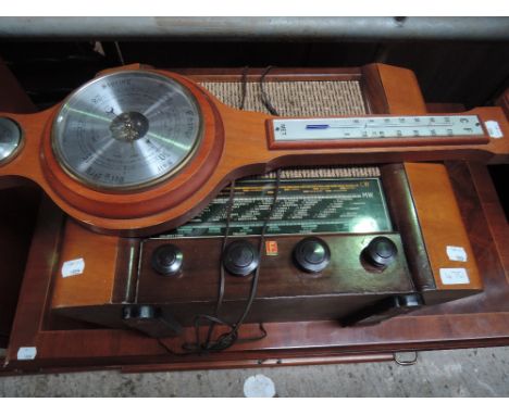 A vintage Feranti radio and barometer 