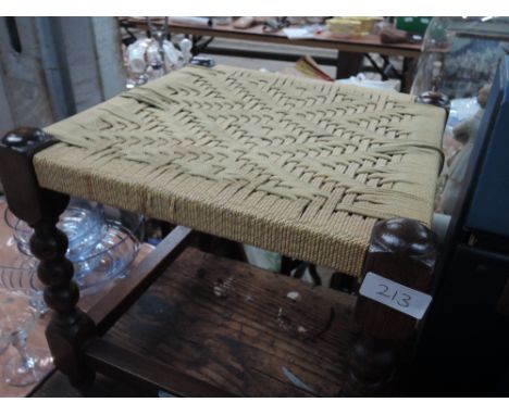 A vintage woven cord seated stool