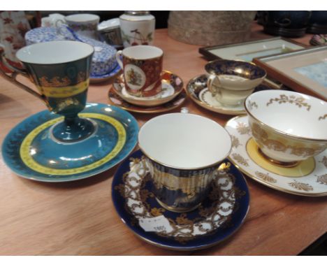 A selection of cups and saucers including Aynsley and Royal Worcester