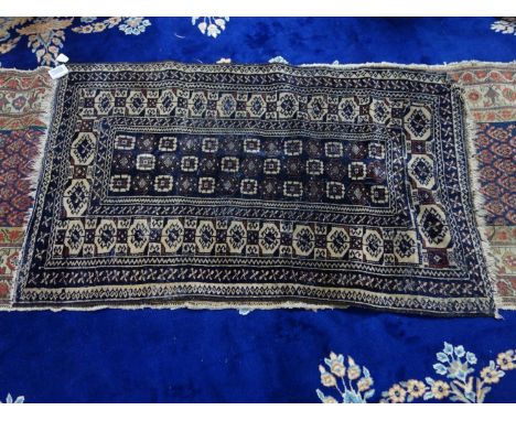 A vintage Afghan rug with geometric design, 150 x 95cm 