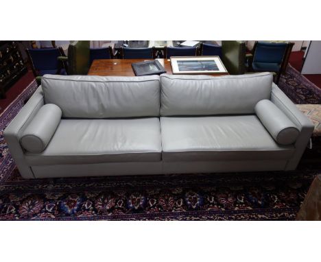 A Content by Terrance Conran '59th Street' 3 Seat Sofa, in grey leather upholstery, raised on chrome supports, H.65 W.233 D.8