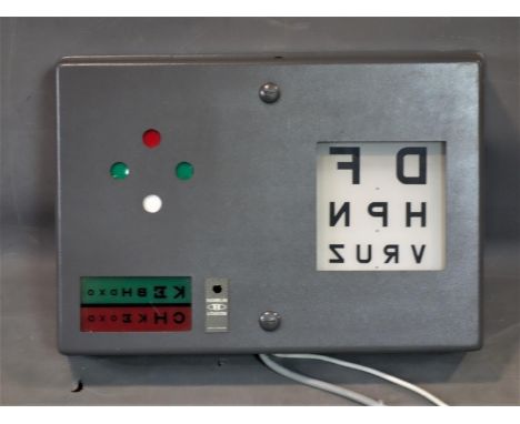 A Vintage opticians eye test machine by Hamblin, London, H.15 W.62 D.44cm 