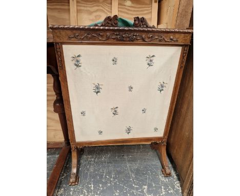 A WALNUT FIRE SCREEN. 