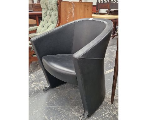 A MODERNIST LUXY ARROW ARMCHAIR WITH FORWARD CASTORS FOR DINING&nbsp;&nbsp;