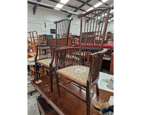 A PAIR OF EARLY 20th C. COMB BACK ARMCHAIRS. 