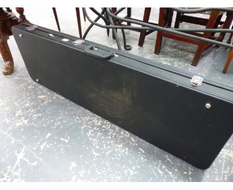 A STAGG HARD GUITAR CASE.