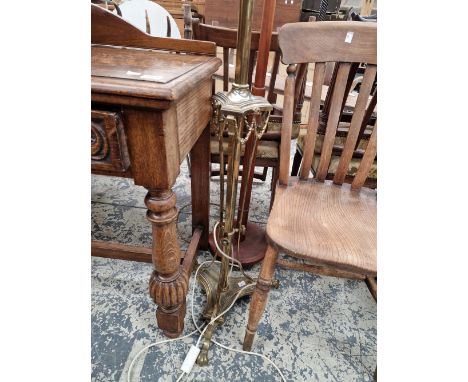 A BRASS STANDARD LAMP.