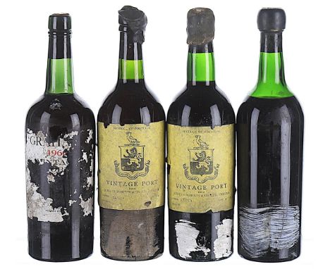 1963 Taylor's, Vintage Port Shipped and bottled by Quellyn Roberts, Chester.  Level IN, label soiled and torn, capsule cracke