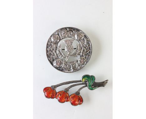 Two silver brooches, one with enamel in the Art Nouveau style