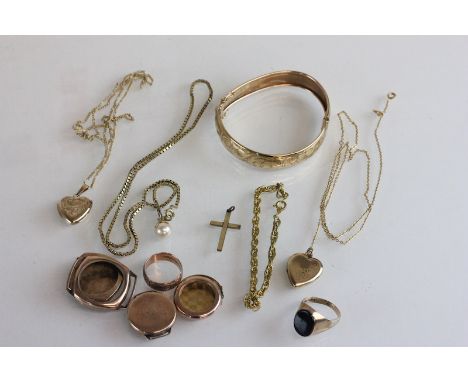 A 9 carat gold onyx signet ring; with a 9 carat gold patterned wedding ring; a 9 carat gold heart locket on a chain; a damage
