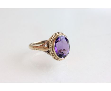 9ct Gold Hallmarked Ring set with a Large Oval Amethyst
