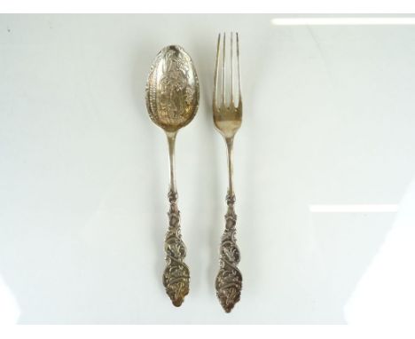 A childs spoon and fork set, by Levi & Salaman, Birmingham 1903, the bowl embossed 'This Little Pig Went to Market' with an i