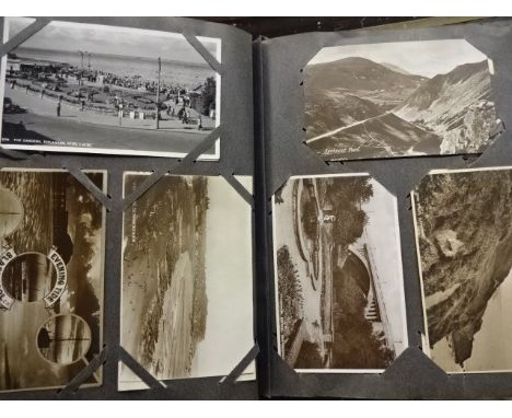 Folder of mostly vintage postcards, mostly tourist related