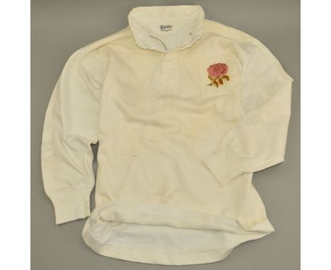LILLYWHITES WHITE RUGBY SHIRT, with the England Red Rose logo stitched on to the front, a light brown number 10 has been stit