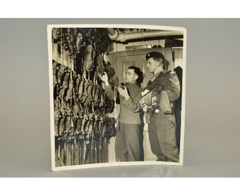 WOLVERHAMPTON WANDERERS TRAINER AND PLAYER IN ARMY UNIFORM, in the boot room at Molineux dated 1952 (R.Saidman)