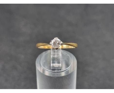 A yellow metal diamond solitaire ring, of approximately 0.25ct, stamped 18ct, size L. 