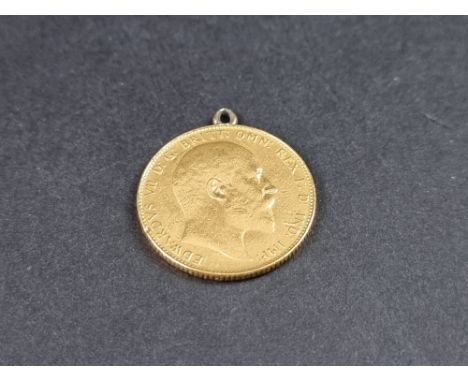 Coins: an Edward VII 1908 gold sovereign, in ring mount. 