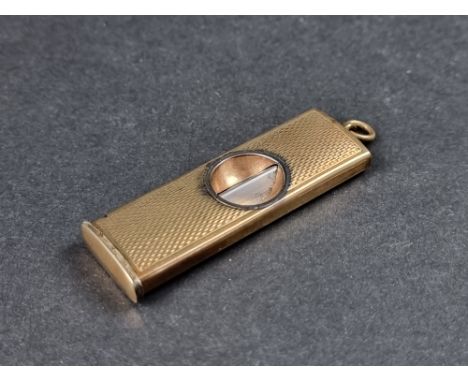 A 9ct gold and steel cigar cutter, having engine turned decoration, by W.M Ltd, Birmingham 1967, 53mm long. 