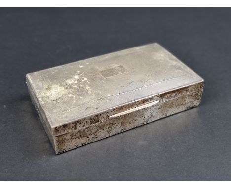 A silver engine turned cigarette box, by Harman Brothers, Birmingham 1951, 15cm wide. 