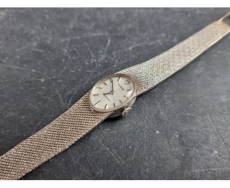 A 1984 Tudor 'Precision' 9ct white gold manual wind wristwatch, Serial No. 92530, on original integrated Milanese bracelet. 