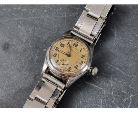 A 1940s Rolex Oyster stainless steel manual wind wristwatch, 29mm, Ref. 3121, on associated expanding bracelet.