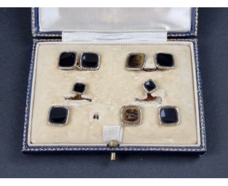 A cased set of onyx cufflinks,&nbsp;collar studs and buttons, stamped 'plat 14k', (one button missing). 