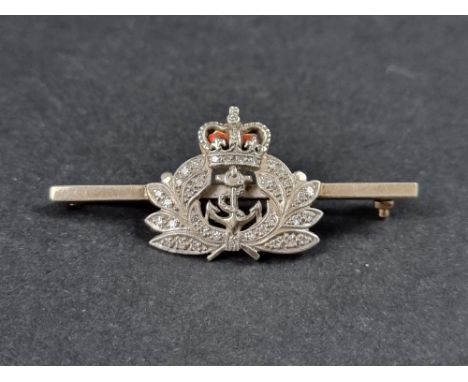 A 9ct gold Royal Naval sweetheart brooch, decorated with red enamel and set small diamonds, 50mm wide, 6.3g. 