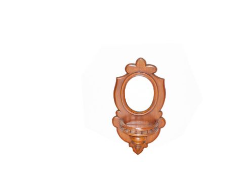 A Mahohany Framed Mirror Backed Wall Bracket 
