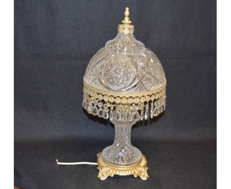A Large Gilted and Metal and Crystal Lamp 