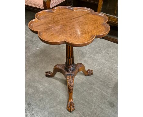 A Chippendale style carved mahogany tripod wine table 