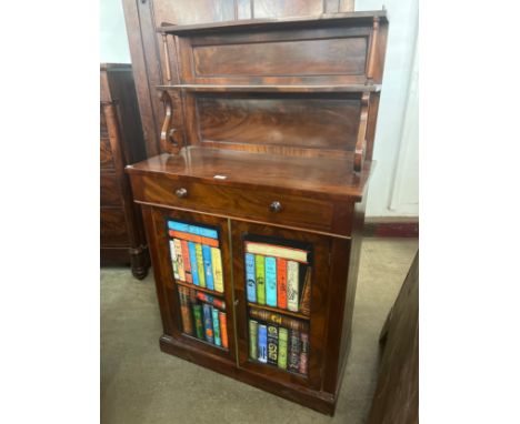 A Regency mahogany chiffonier, with later faux book doors 