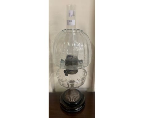 A Victorian glass and brass oil lamp 