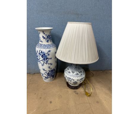 A blue and white porcelain vase and a table lamp 